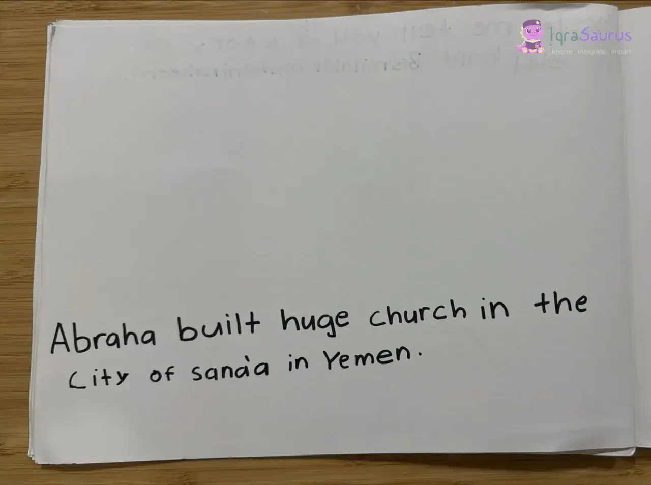 A blank page left for a picture, with one sentence written along the bottom.