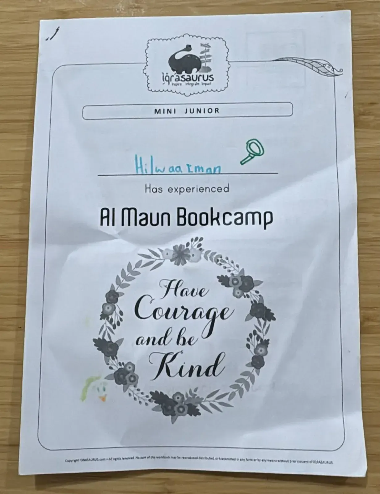 Hilwaa's Al Maun Bookcamp Mini Junior cover, with the words "Have Courage and be Kind"